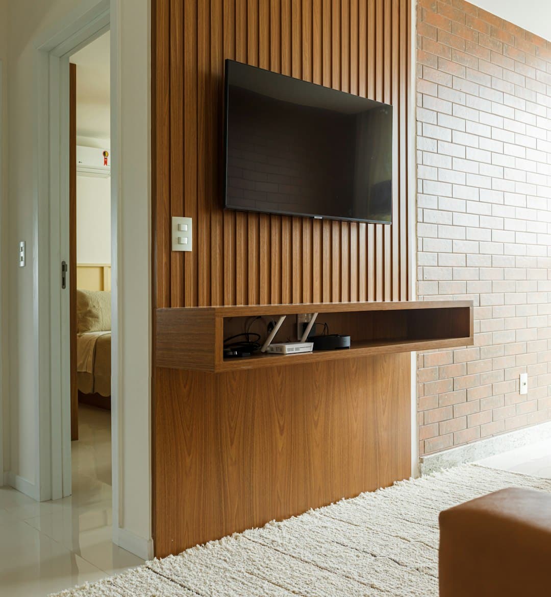Television along with Storage and Decorative Elements